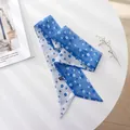 Close-up view of a delicate blue floral chiffon hair scarf with French vintage floral pattern - 100cm*6cm / Blue White Contrast Floral