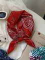 Detailed view of a soft red paisley pattern cotton linen square neckerchief scarf - 14 Cashew Red