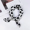 Elegant white silk neck scarf with black heart pattern print, tied in a stylish knot - 10-petal White / 50-50cm