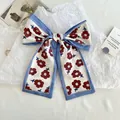 Elegant blue floral silk scarf tied in a large bow, premium hair accessory for women. - Burgundy Small Flowers (fs-long Striped Flat Angle)