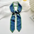 Elegante groene smalle sjaal met Boogschutter-print voor in het haar of aan een tas. - Boogschutter