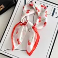 Elegant silk-like neck scarf featuring red cherry print and contrast red border - Red Cherry - Off-white