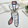 Elegante smalle sjaal met Waterman sterrenbeeld thema in blauw en beige voor dames 2025 - Waterman