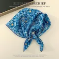 Elegant blue floral cotton linen kerchief scarf for women as a stylish fashion accessory. - Small Snowflake Basket