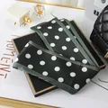 Elegant deep green narrow silk scarf featuring white polka dots and a golden border detail - L040-02-06 Polka Dot - Dark Green