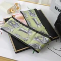 Elegant green silk twilly scarf featuring a vintage horse head sketch print pattern - L040-06-03 Giraffe - Green