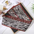 Elegant zebra print skinny satin scarf for hair or luxury handbag handle decoration - L040-33-01 Black Card Leopard Print - Rust Red Edge