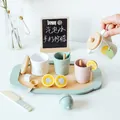 Wooden pretend play tea set for children featuring colorful cups and a miniature teapot - Lemon Tea Set