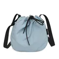 Light blue lightweight nylon drawstring bucket bag with adjustable black shoulder strap - Blue