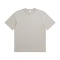 Detailed view of a loose-fit round neck cotton T-shirt in light grey marl color - S / Tops / Sand