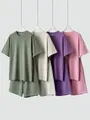 Unisex katoenen T-shirt en korte broek set in de kleuren groen crème paars en roze. - S / Boven- En Onderstuk / Tie-Dye Meerkleurig