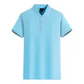 Polo à manches courtes bleu clair avec détails rayés blancs au col et aux poignets - S / Hauts / Bleu ciel