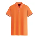 Polo à manches courtes orange vif en coton mercerisé avec des détails rayés blancs - S / Hauts / Orange