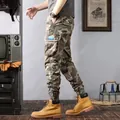 Men's camouflage cargo pants with side pockets and elastic cuffs in a vintage style - 28 / Bottoms / Khaki Camouflage
