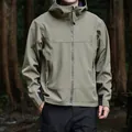 Veste coupe-vent à capuche softshell pour homme vert olive loisirs en plein air - M / Hauts / Kaki