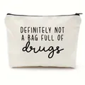 Close-up detail of a white canvas cosmetic pouch with humorous text design and zipper - Beige