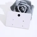 Close-up of blank white cardboard earring display cards for jewelry packaging - Rectangular Style(5912624298405) / White