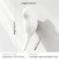 Minimalist white ceramic bird-shaped wall hook with dimensions and weight specifications - White