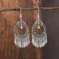 Pendientes étnicos de plata Miao con diseño hueco ornamentado y borlas de hojas - E1848