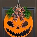 Halloween pumpkin wooden door hanger with bow and green leaves for home decor - Angry Pumpkin Door Sign