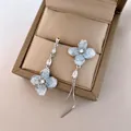 Elegant light blue flower asymmetrical earrings with diamond accents in a jewelry box - Silver Earring Post - Silver - Blue