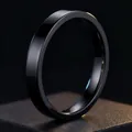 Sleek minimalist black polished stainless steel ring variant on dark textured background - Size 7 / Domed Inside, Flat Outside / 4mm / Black