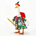 Kleurrijke studentenoutfit voor veranda gans met een rode hoed en een rugzak - Terug naar School Groene Outfit Stijl