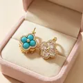 Elegant vintage-style four-leaf clover earrings with blue and clear gemstones in a gift box - Blue Pine Zirconia Double-Sided Flower Ear Buckle (2607116)