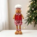 Vue détaillée d'une poupée de pain d'épices de Noël habillée en chef cuisinier - Poupée Bonhomme de Pain d'Épices Télescopique Homme
