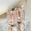 Elegant U-shaped micro-pave zircon hoop earrings featuring sparkling pink stones - Silver Color With Pink Stones