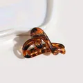 Elegant Ankara red amber hair claw clip with heart-shaped twist design for women - Heart Leopard Claw Clip