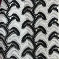 Detailed close-up of black and white wavy lace fabric with sexy hollow-out pattern for dress - S / Top And Bottom / Black and White