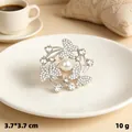 Elegant silver butterfly brooch featuring sparkling rhinestones and a central white pearl - Three Butterflies / Silver