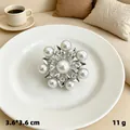 Elegant silver-toned flower brooch decorated with white pearls and rhinestones, 11g - Seven-Petal Octagram / Silver