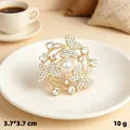 Elegant gold butterfly brooch with rhinestones and central pearl, size 3.7x3.7cm - Three Butterflies / Gold