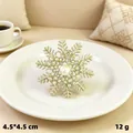 Elegant gold-tone snowflake brooch with clear rhinestones and central faux pearl detail - Silver Dotted Snowflake