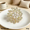 Elegant gold starburst brooch with white pearls and sparkling rhinestones for women - KC Gold Five Pearls Star