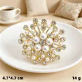 Vintage eight-pointed star brooch featuring white pearls and sparkling rhinestones - KC Gold Star Pearl Rhinestone