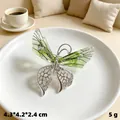Elegant green butterfly brooch with rhinestones and honeycomb detail in silver finish - Silver Green Butterfly