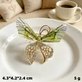 Vintage green resin butterfly brooch with sparkling rhinestones for scarves and coats - Gold Green Butterfly