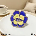 Vintage blue and yellow flower brooch pin with sparkling rhinestone trim and Dior logo - Silver Yellow Blue Camellia