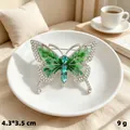 Elegant green butterfly brooch with sparkling rhinestones and teardrop crystals. - Silver Green Diamond Butterfly
