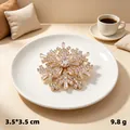 Eight-pointed star rhinestone brooch pin for sweaters and scarves with gold finish - Gold Snowflake Zirconia