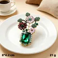Elegant vintage floral bouquet brooch with green crystal vase and pink rhinestones, 21g - Crystal Flower Vase
