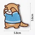 Parche bordado de nutria de dibujos animados de 5,8 cm x 5,6 cm sobre fondo blanco - Estilo de Nutria (1485)