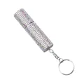 Detail view of a portable rhinestone-encrusted perfume atomizer bottle with a keychain - AB White