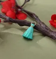 Mini turquoise silk tassel pendant with golden ring for DIY jewelry charm making - Autumn Incense Green