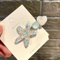 Süße glitzernde Meer-Seestern und Herz Haarklammer für Mädchen im verspielten Meerjungfrau Stil - Eis Herz Seestern / Weiß