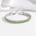 Silver-tone titanium steel bracelet featuring vibrant green circular zircon stones - Green (TT0271)