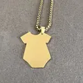 Macro view of polished gold titanium steel hip-hop necklace with unique baby bodysuit pendant - Necklace Set / Gold
